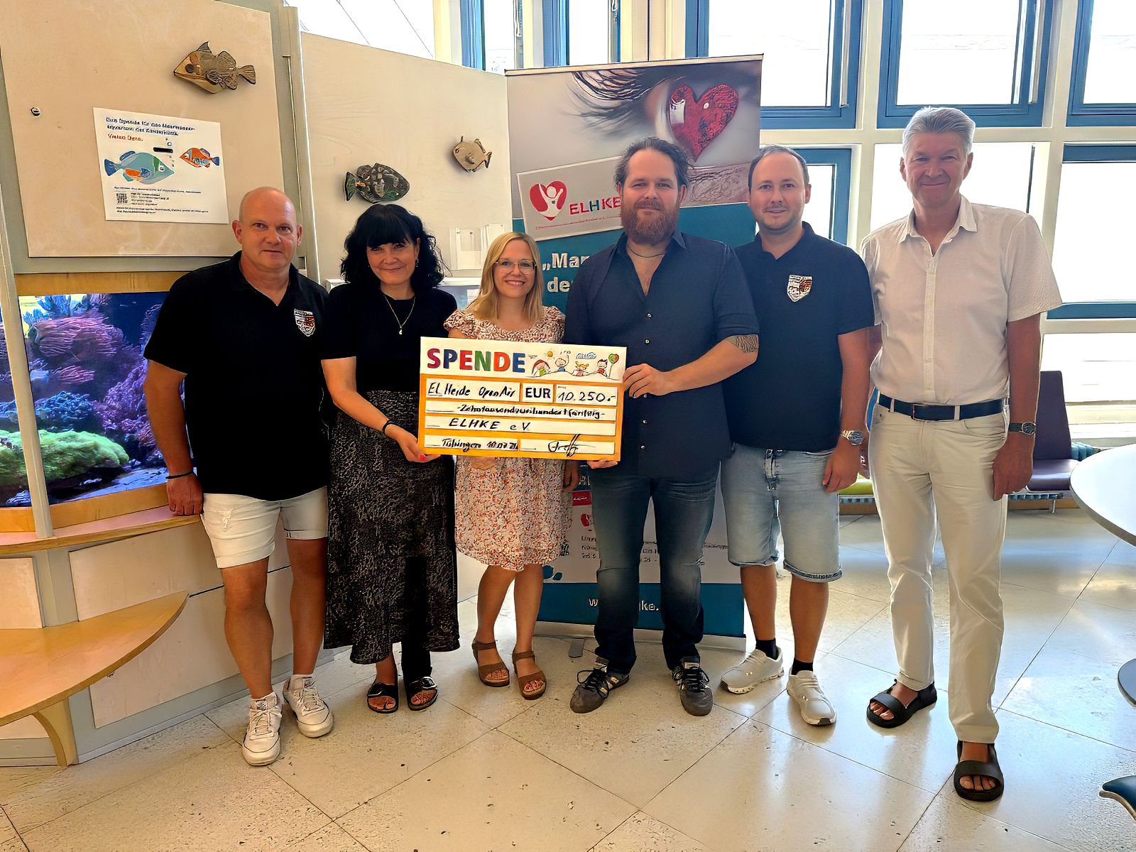 Scheckübergabe Elektro Heide und Fischerverein